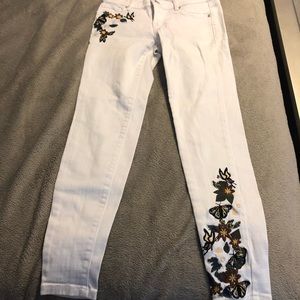 White jeans with 3 designs